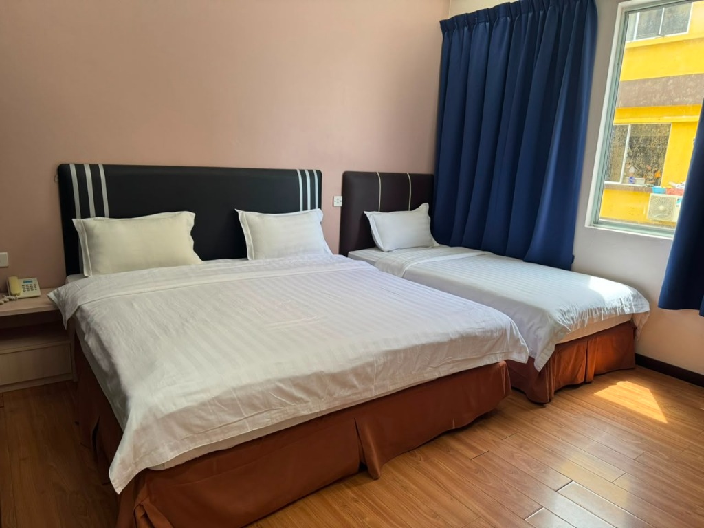 Salim Inn family room with multiple beds